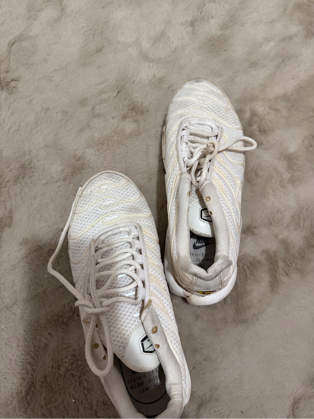 Nike Women’s White Athletic Sneakers with Gold Accents